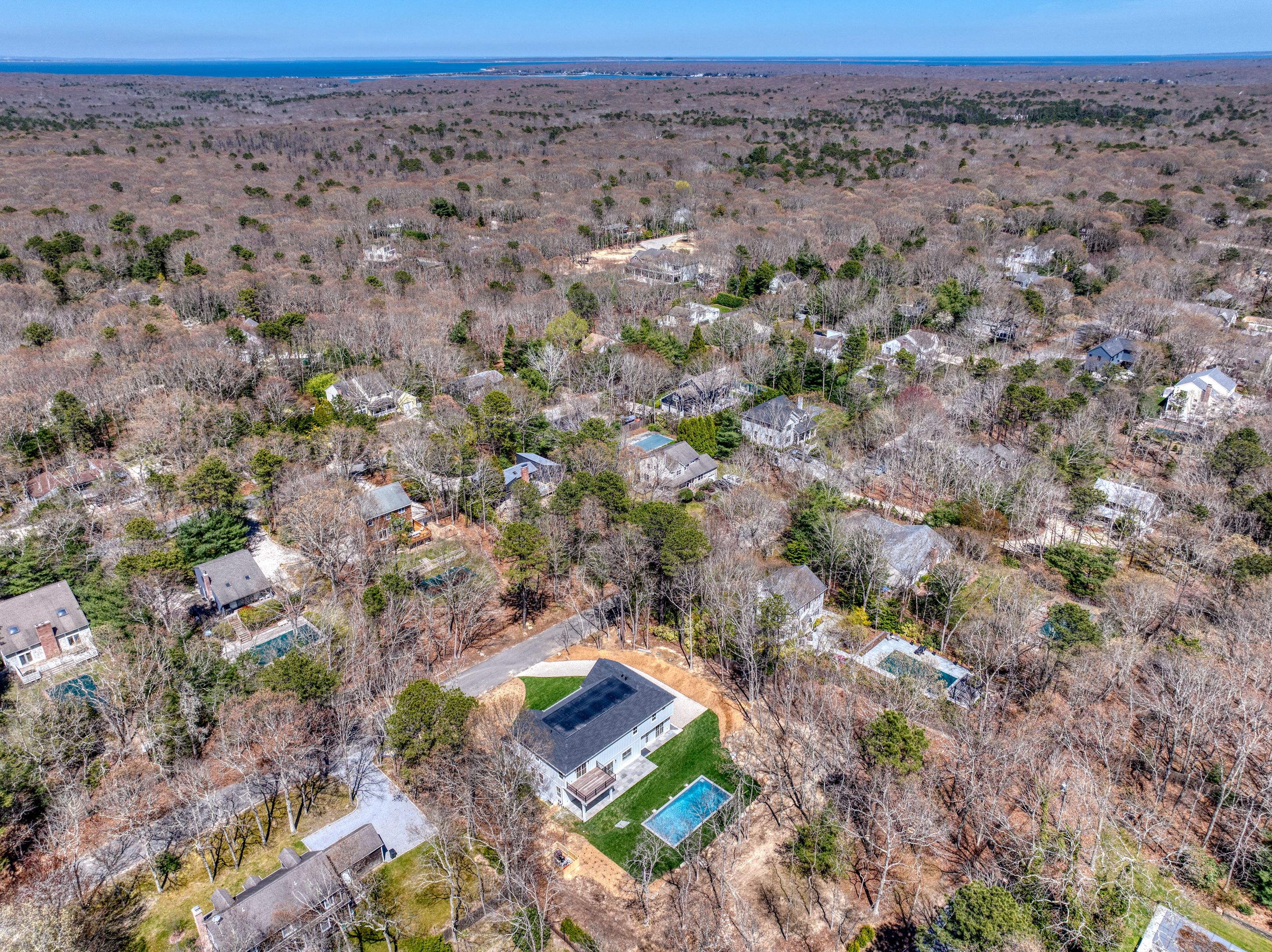 18 Barnes Avenue East Hampton, NY 11937 - Photo 29 of 35 a view of a dry field with trees in the background