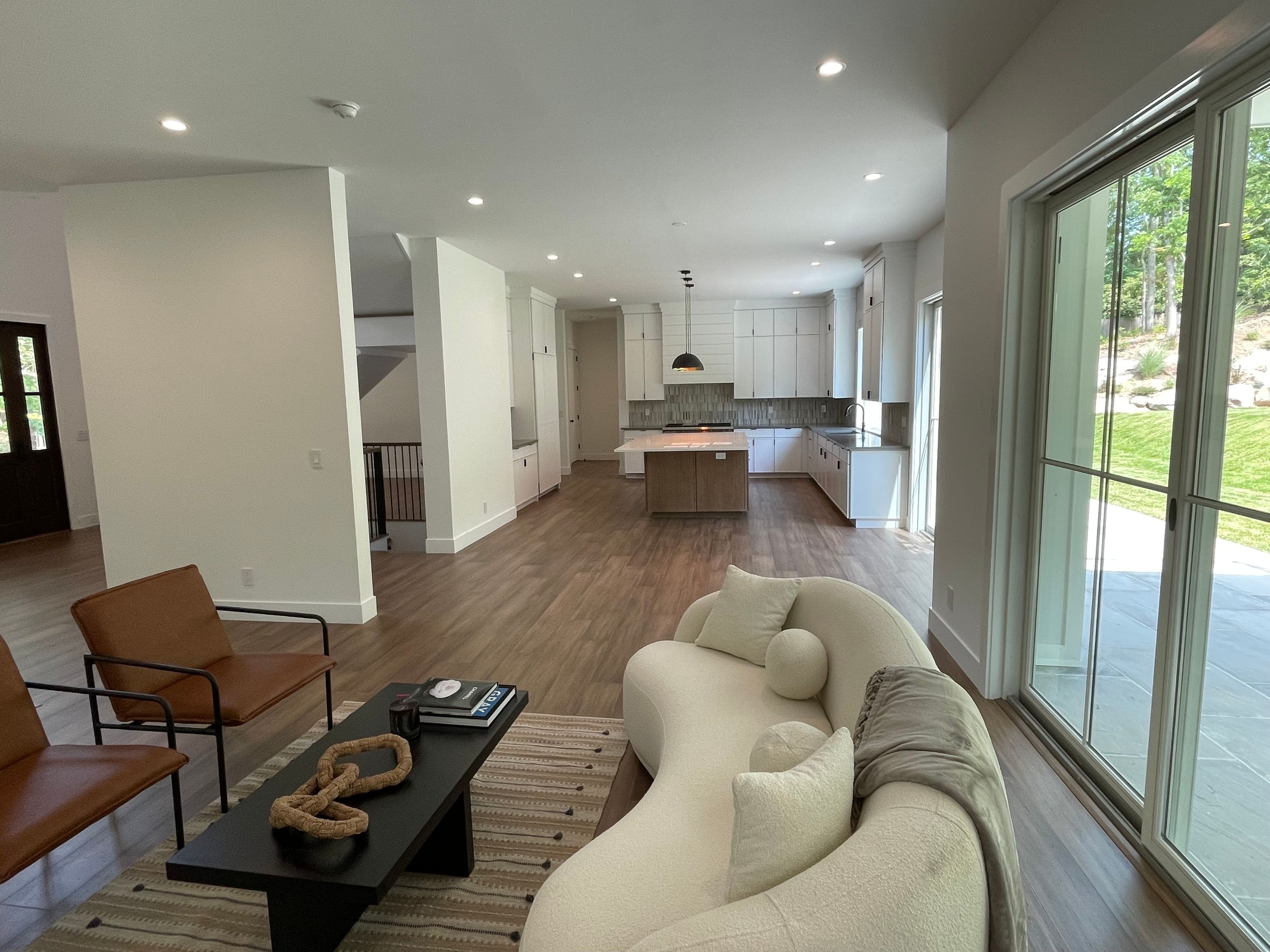 18 Barnes Avenue East Hampton, NY 11937 - Photo 31 of 35 a living room with furniture and a large window