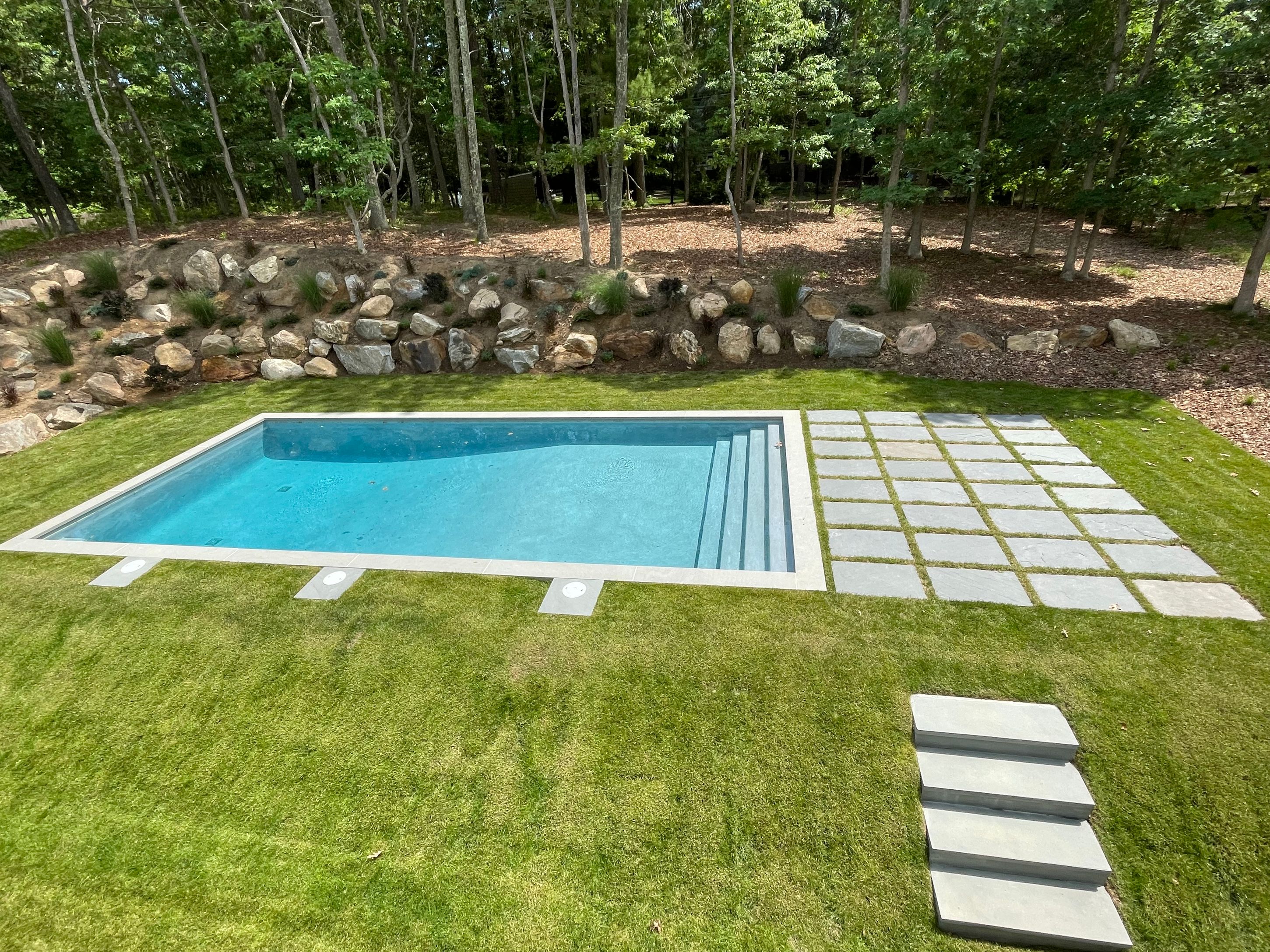 18 Barnes Avenue East Hampton, NY 11937 - Photo 32 of 35 a view of a yard with plants