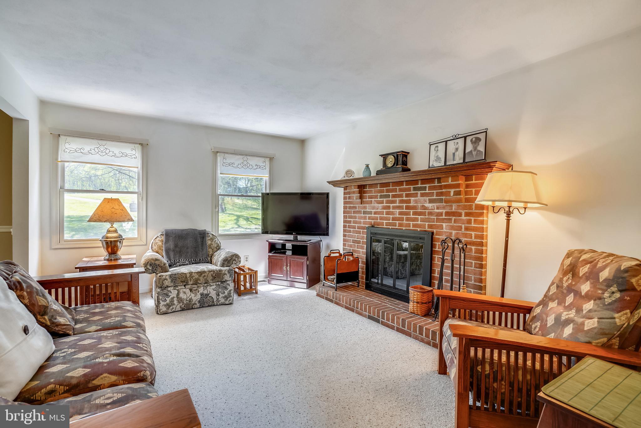 8539 Edenton Road Fulton, MD 20759 - Photo 17 of 39 Family room with wood burning fireplace