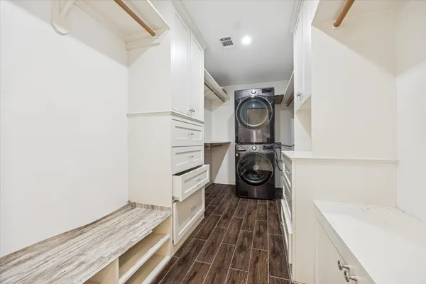 a view of a closet with storage and utility