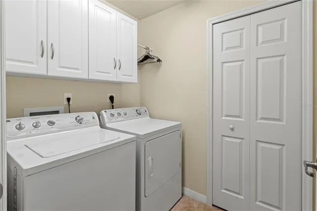 a view of a lake with houses in the back