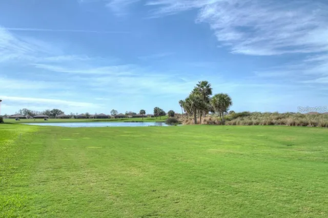 a aerial view of a house with swimming pool