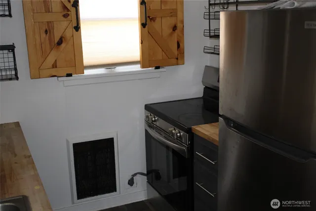 closeup of a sink and dishwasher