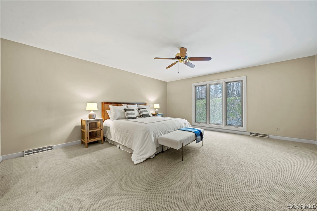 13703 Beechwood Point Road Midlothian, VA 23112 - Photo 19 of 50 a bedroom with a bed and window