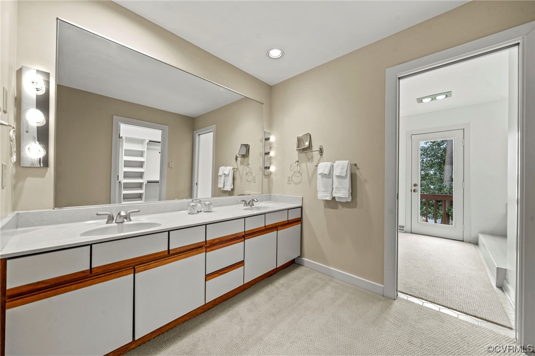 13703 Beechwood Point Road Midlothian, VA 23112 - Photo 21 of 50 a bathroom with double sink and a mirror