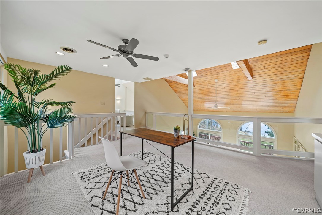 13703 Beechwood Point Road Midlothian, VA 23112 - Photo 26 of 50 a sitting area with furniture and a potted plant
