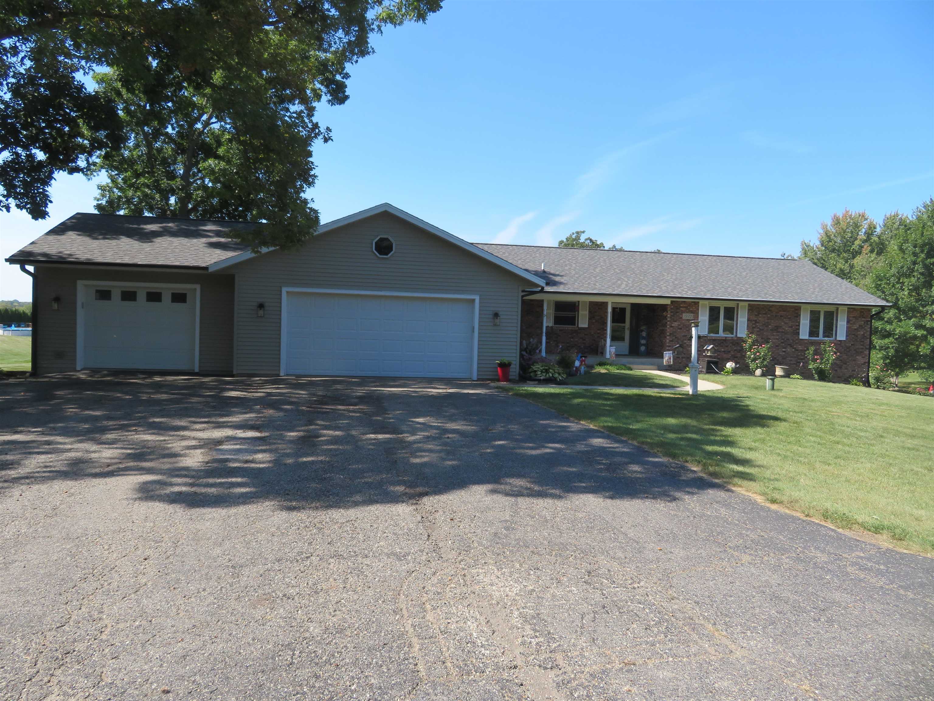 1972 Delmar Drive Freeport, IL 61032 - Photo 1 of 24 front view of a house with a yard