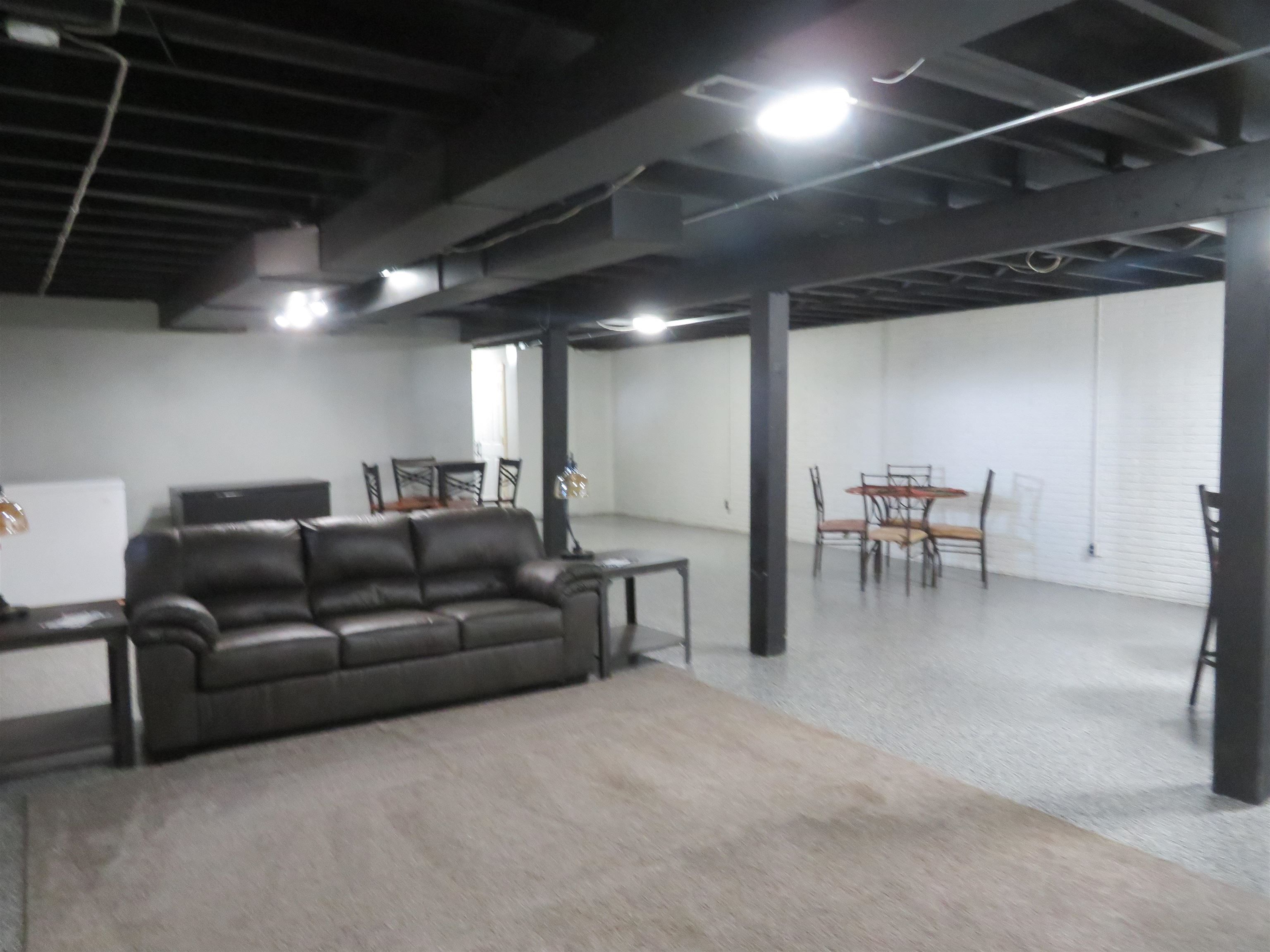 1972 Delmar Drive Freeport, IL 61032 - Photo 16 of 24 a projector room with a couch and a table