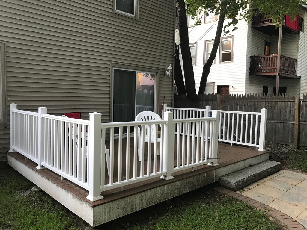 71 Birch Street Worcester, MA 01603 - Photo 18 of 23 a view of a house with wooden fence