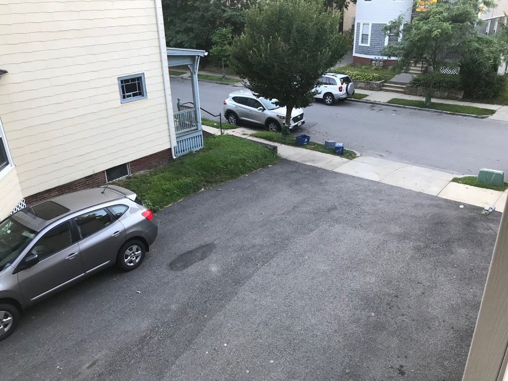71 Birch Street Worcester, MA 01603 - Photo 23 of 23 a car parked in front of a house