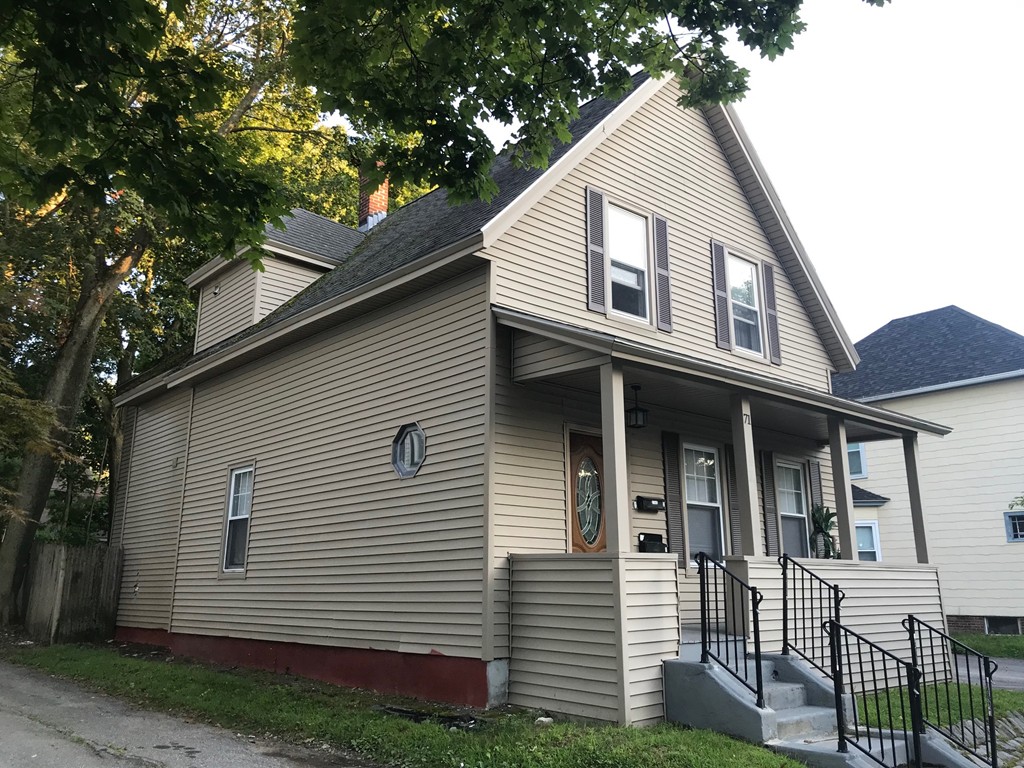 71 Birch Street Worcester, MA 01603 - Photo 3 of 23 a front view of a house with a yard