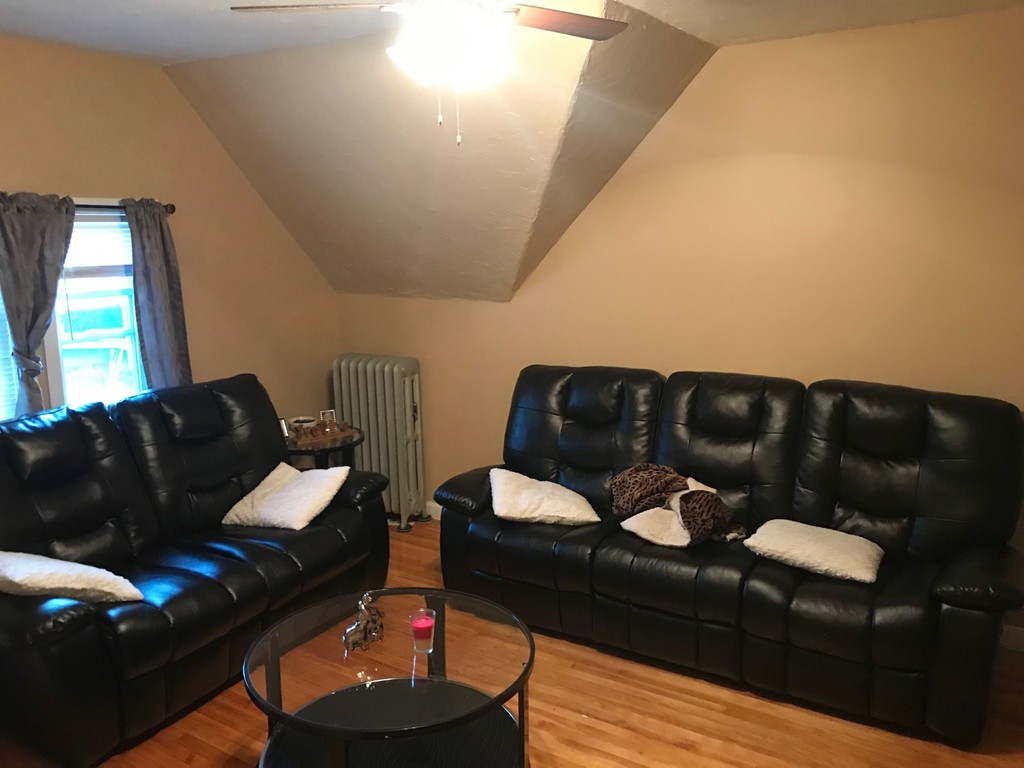 71 Birch Street Worcester, MA 01603 - Photo 5 of 23 a living room with furniture