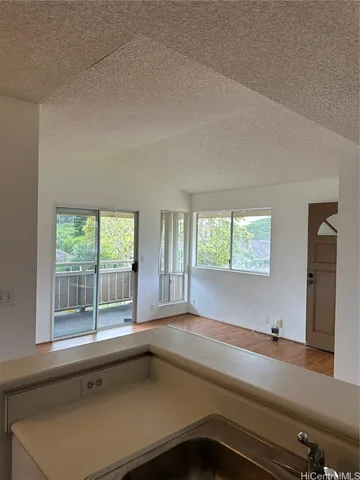 a bathroom with a bathtub and window