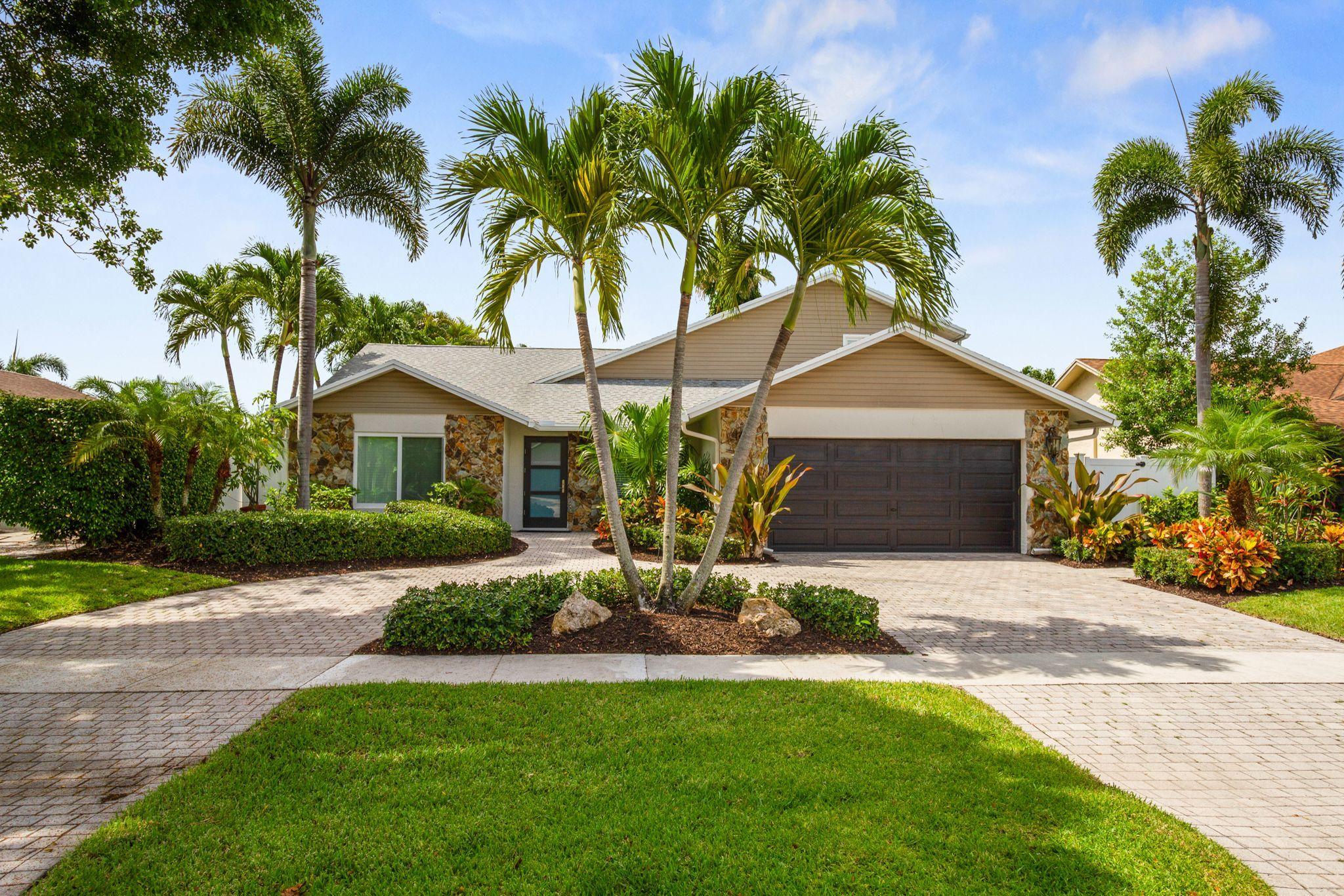 6298 Amberwoods Drive Boca Raton, FL 33433 - Photo 2 of 33 6298 AMBERWOODS FRONT OF HOME
