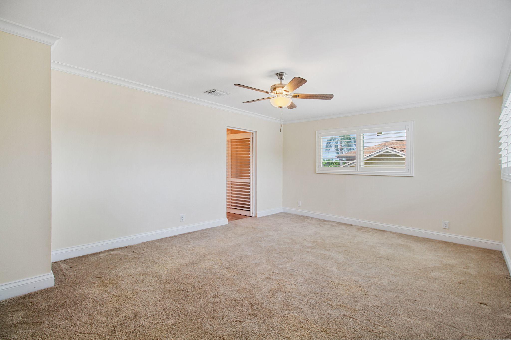 6298 Amberwoods Drive Boca Raton, FL 33433 - Photo 24 of 33 6298 AMBERWOODS MASTER BEDROOM UPSTAIRS