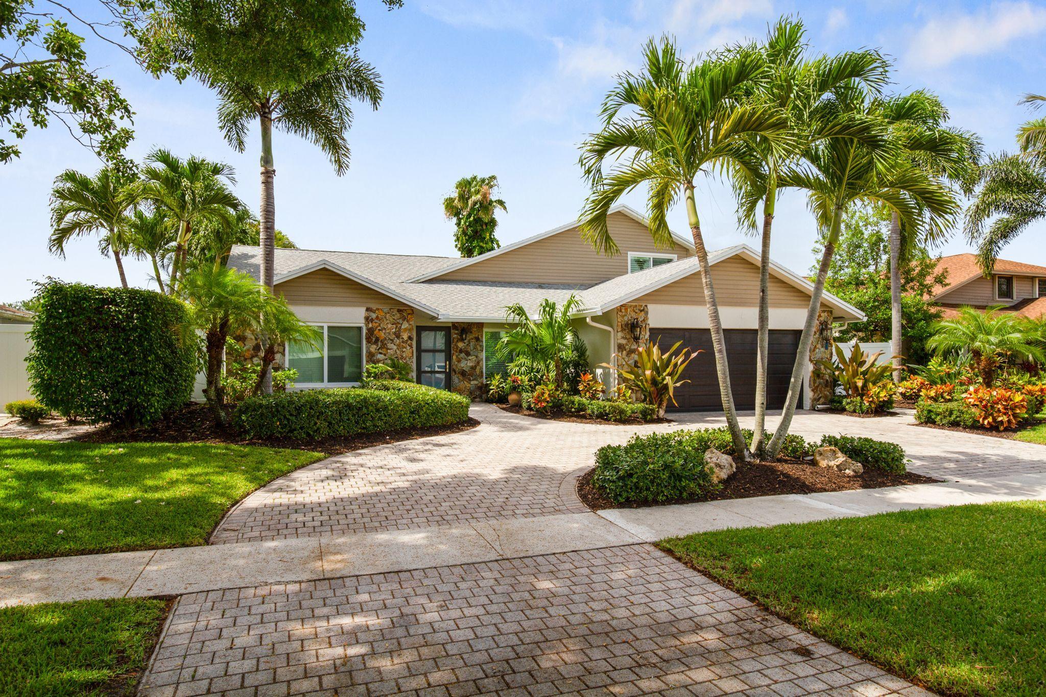 6298 Amberwoods Drive Boca Raton, FL 33433 - Photo 3 of 33 6298 AMBERWOODS FRONT OF HOUSE 2