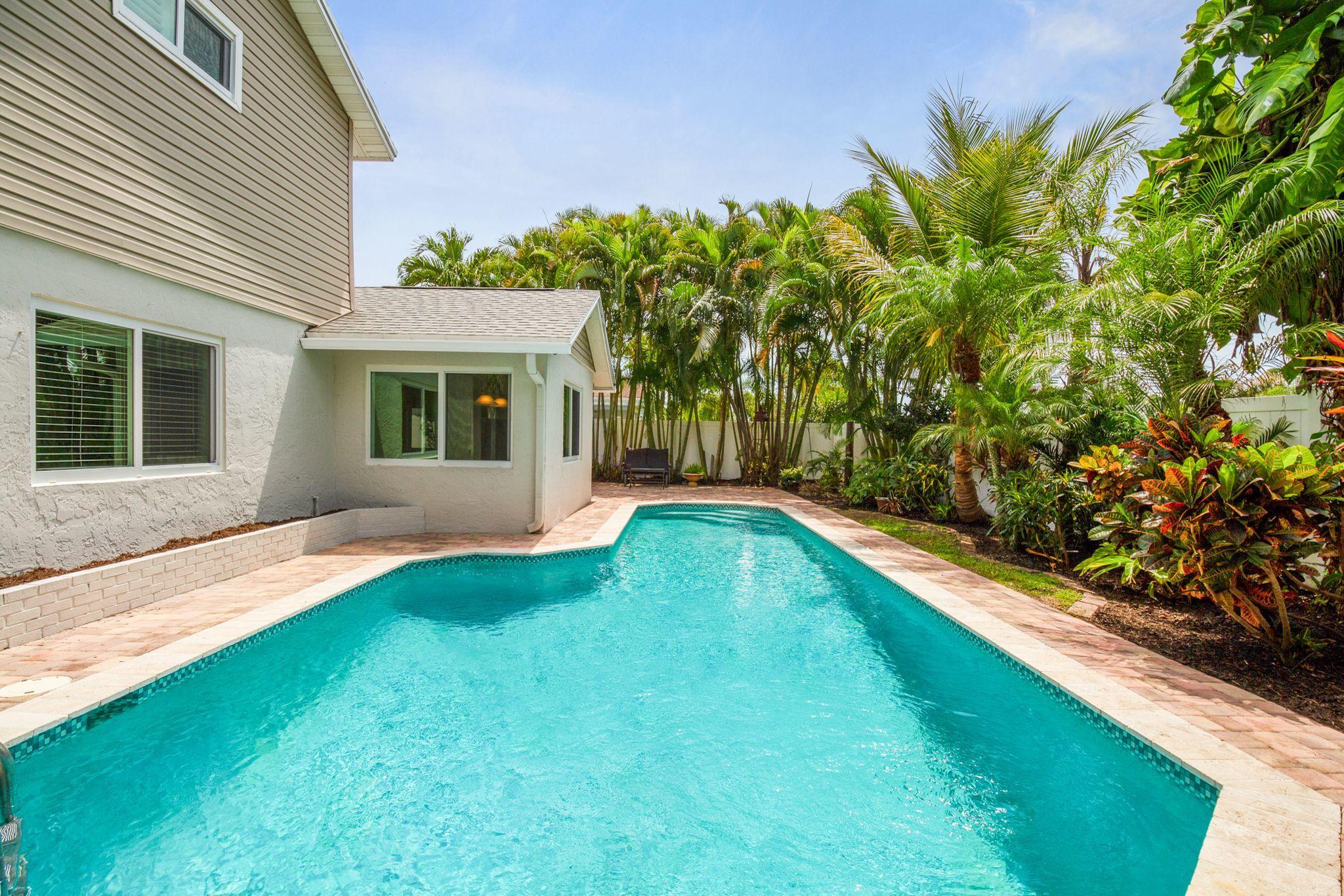 6298 Amberwoods Drive Boca Raton, FL 33433 - Photo 32 of 33 6298 AMBERWOODS BACKYARD POOL AREA
