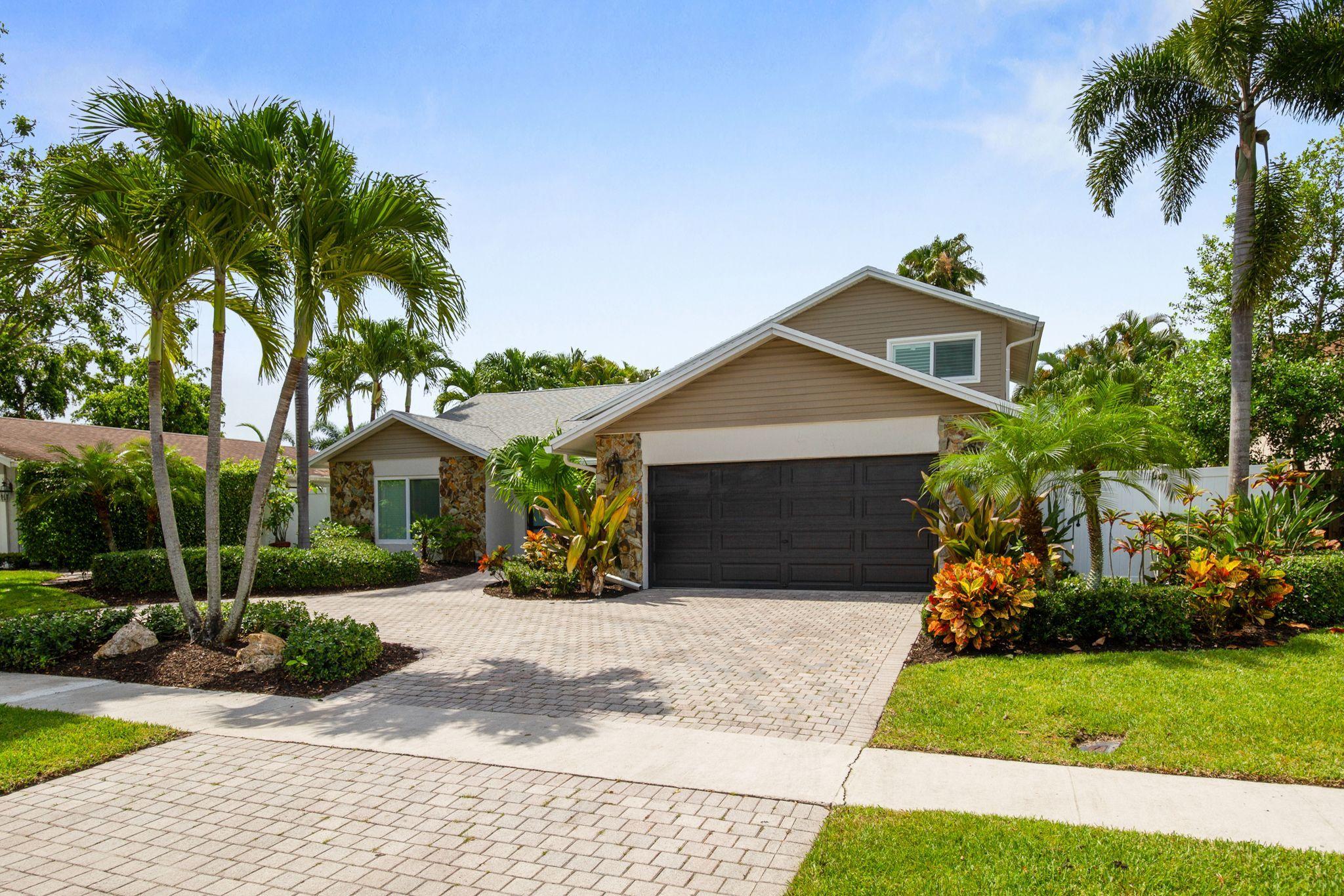 6298 Amberwoods Drive Boca Raton, FL 33433 - Photo 4 of 33 6298 AMBERWOODS FRONT OF HOUSE