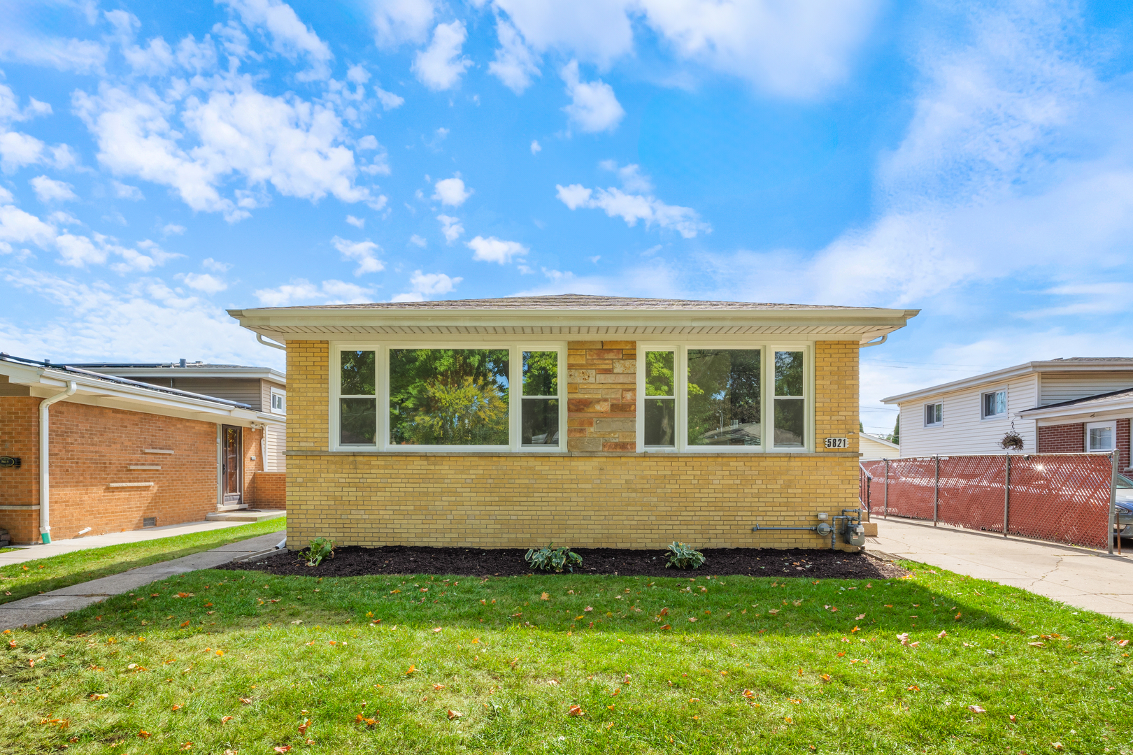 5821 Warren Street Morton Grove, IL 60053 - Photo 2 of 27 a view of house with backyard
