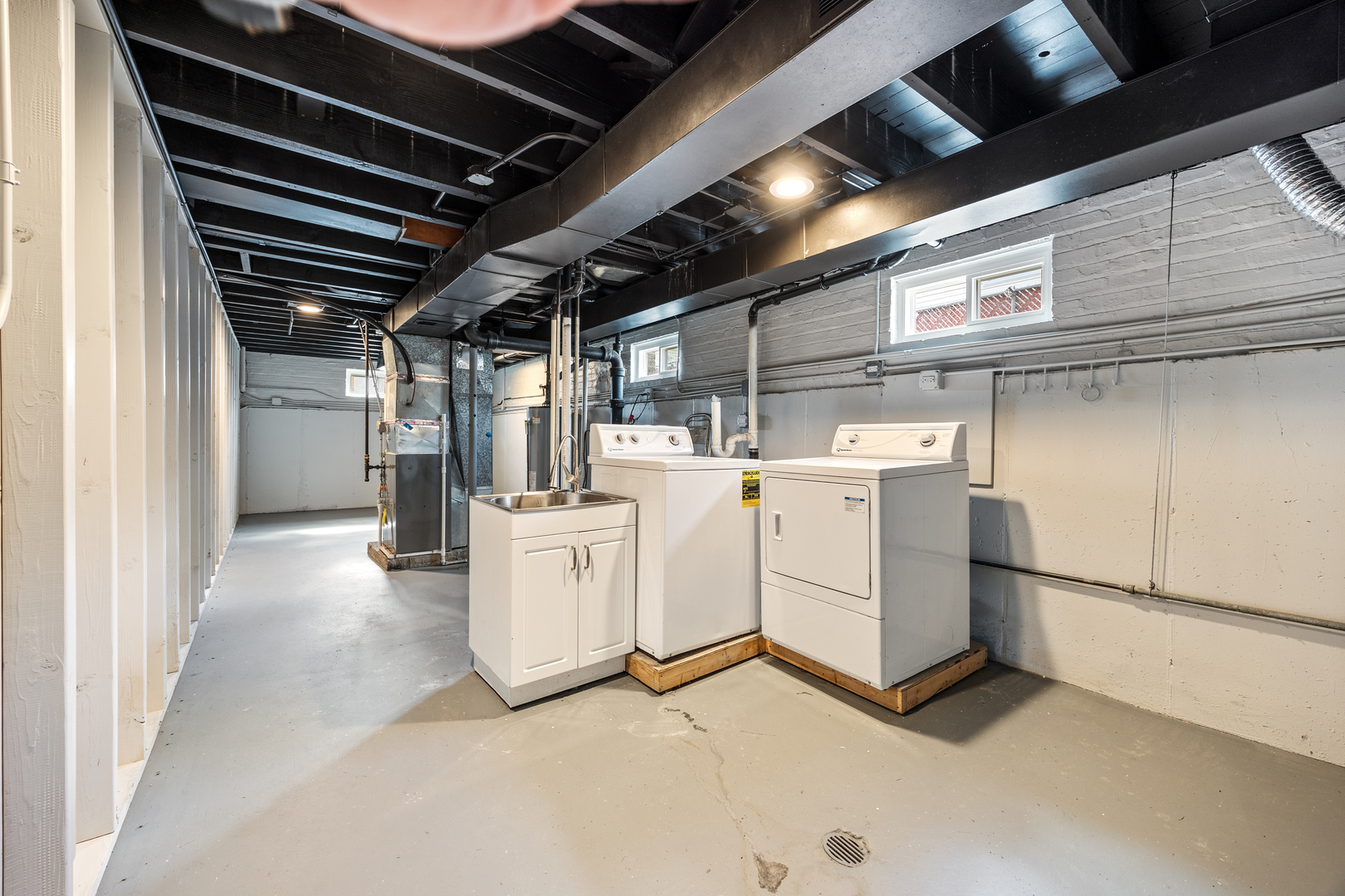 5821 Warren Street Morton Grove, IL 60053 - Photo 21 of 27 a utility room with dryer and washer