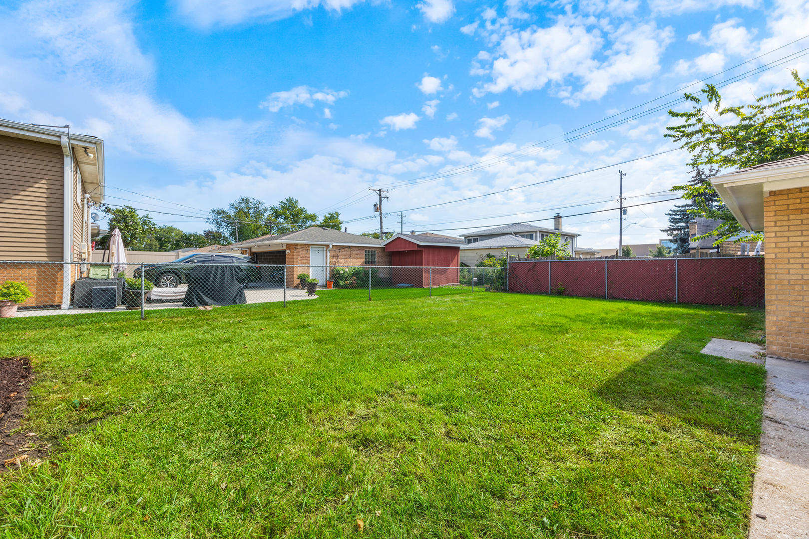 5821 Warren Street Morton Grove, IL 60053 - Photo 23 of 27 a view of an house with backyard space and sitting area