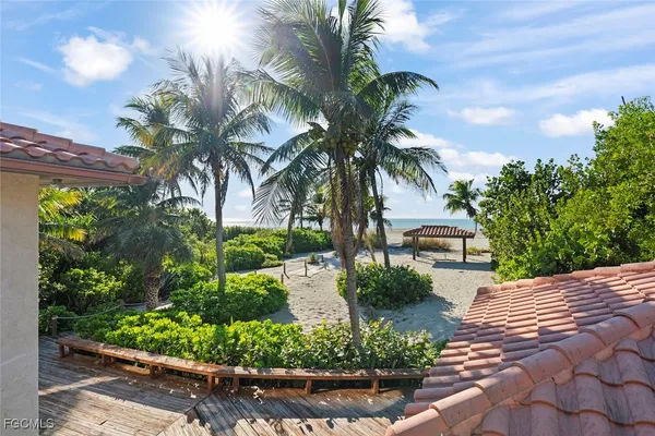 front view of a house with a fountain