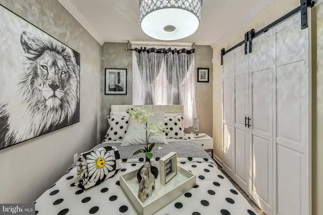 a bathroom with a sink a toilet and shower curtain
