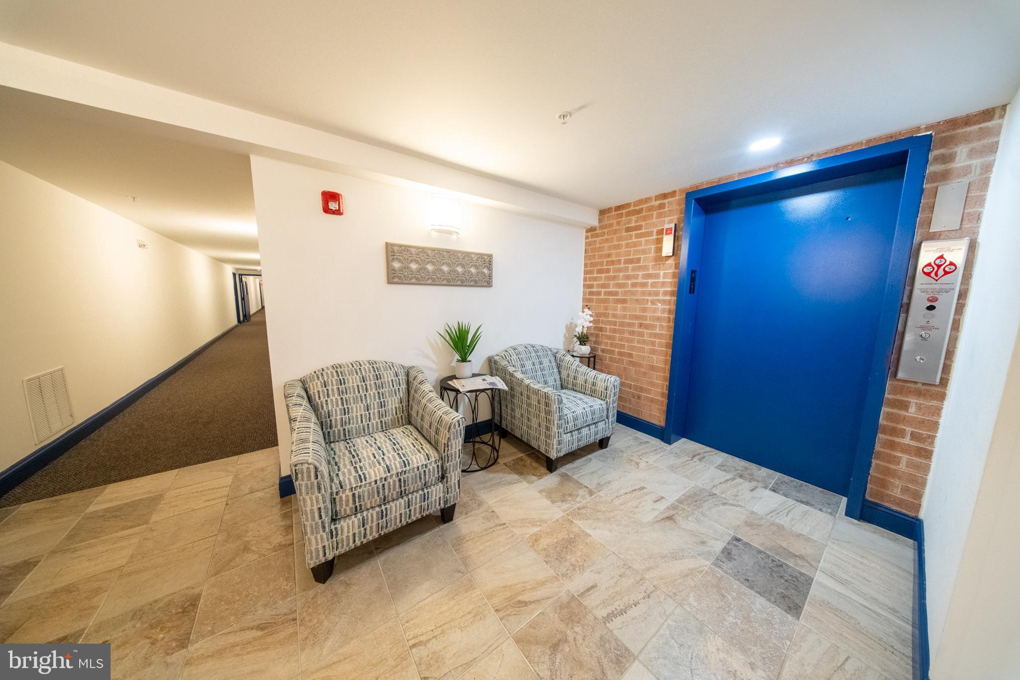 15210 Elkridge Way, Unit 912J Silver Spring, MD 20906 - Photo 34 of 35 Lobby near elevator