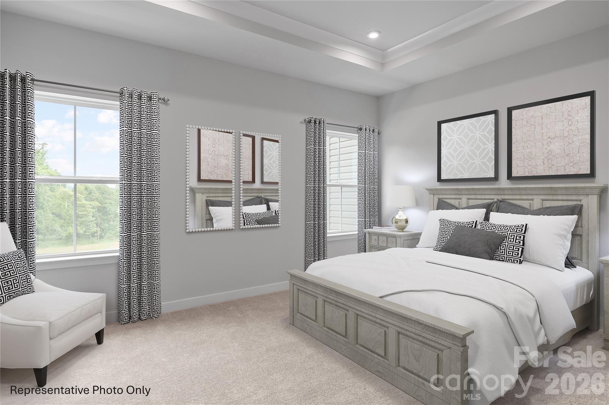 1034 Bracken Hill Road Indian Trail, NC 28079 - Photo 5 of 13 a bedroom with a large bed and windows
