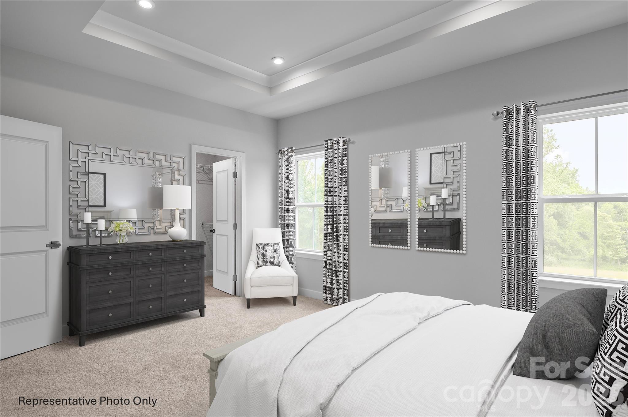 1034 Bracken Hill Road Indian Trail, NC 28079 - Photo 6 of 13 a bedroom with a bed and window