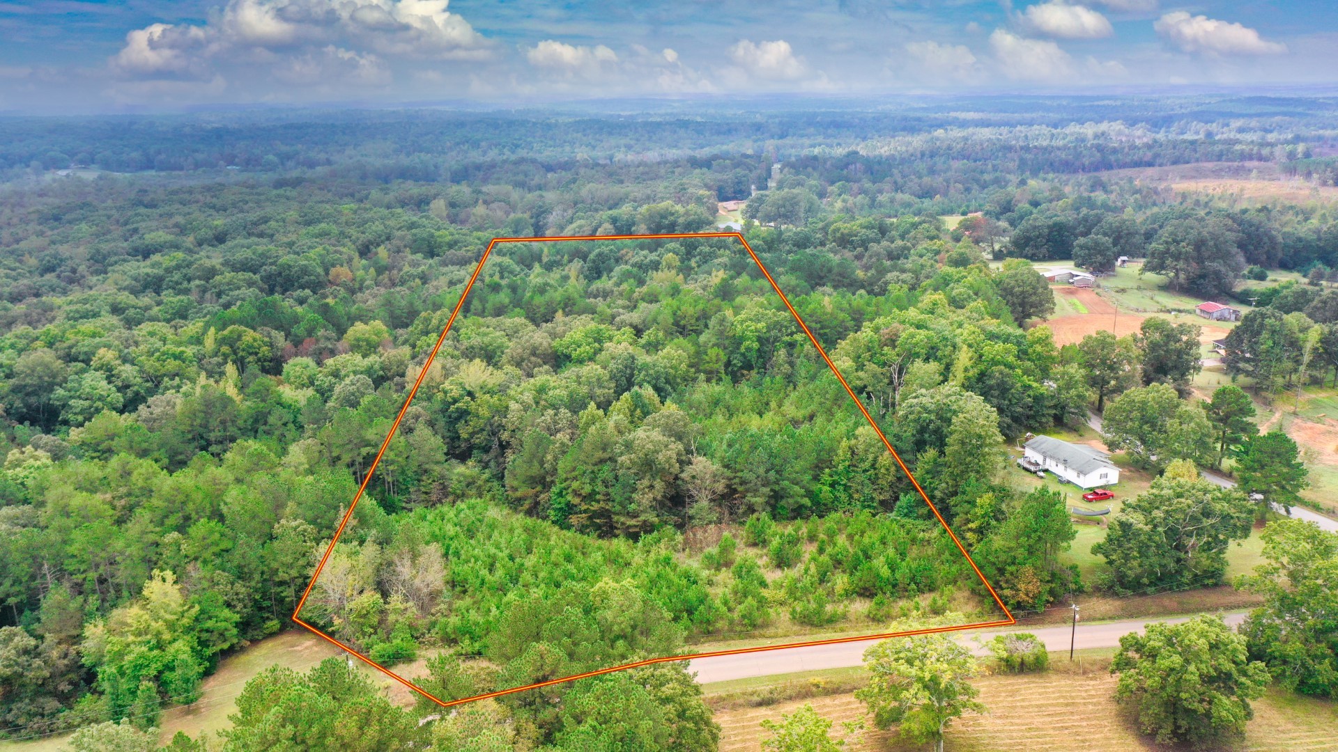 0 Enville Road Henderson, TN 38340 - Photo 8 of 23 a view of a city with lush green forest
