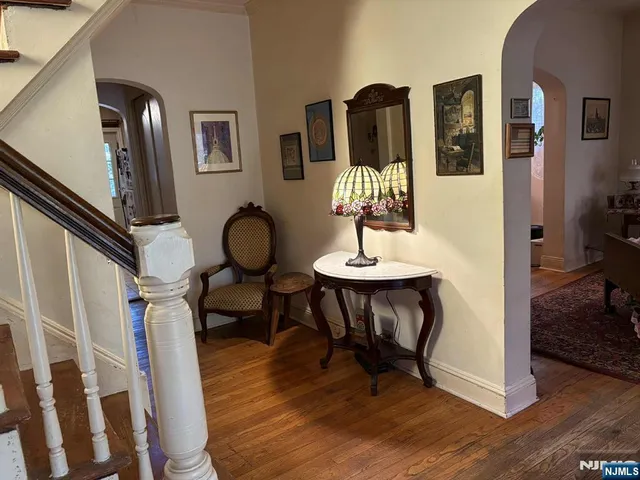 a view of a livingroom with furniture and wooden floor