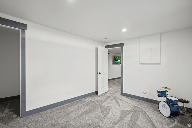 1588 West Rim Rock Drive Stockton, UT 84071 - Photo 32 of 61 Spacious room with plush gray carpeting and white walls