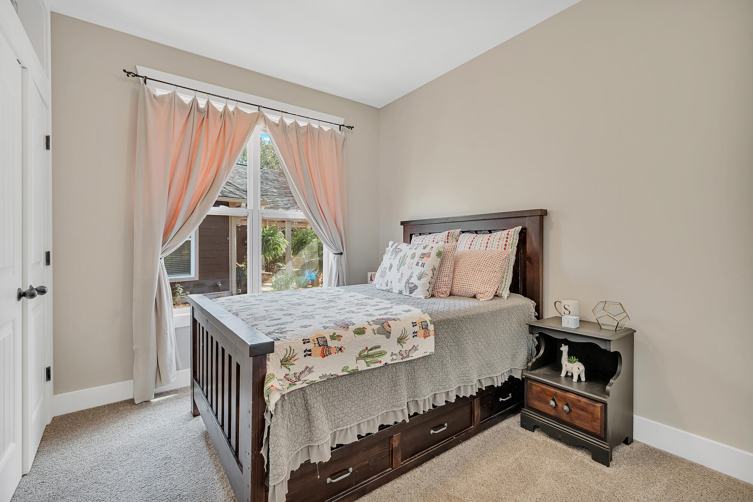 719 Earl Godwin Road Freeport, FL 32439 - Photo 15 of 23 a bedroom with a bed and a window