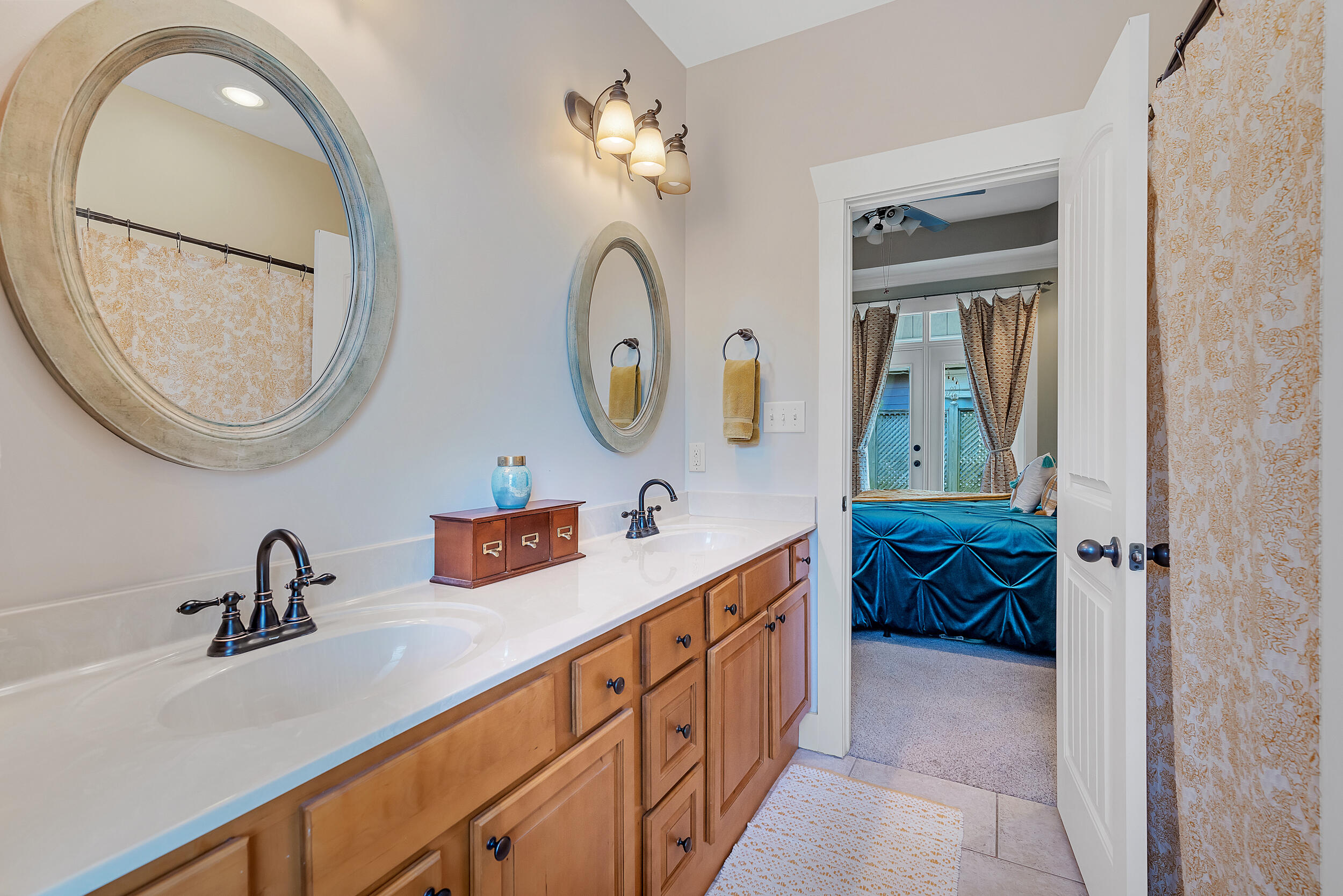 719 Earl Godwin Road Freeport, FL 32439 - Photo 19 of 23 a bathroom with a double vanity sink and a mirror