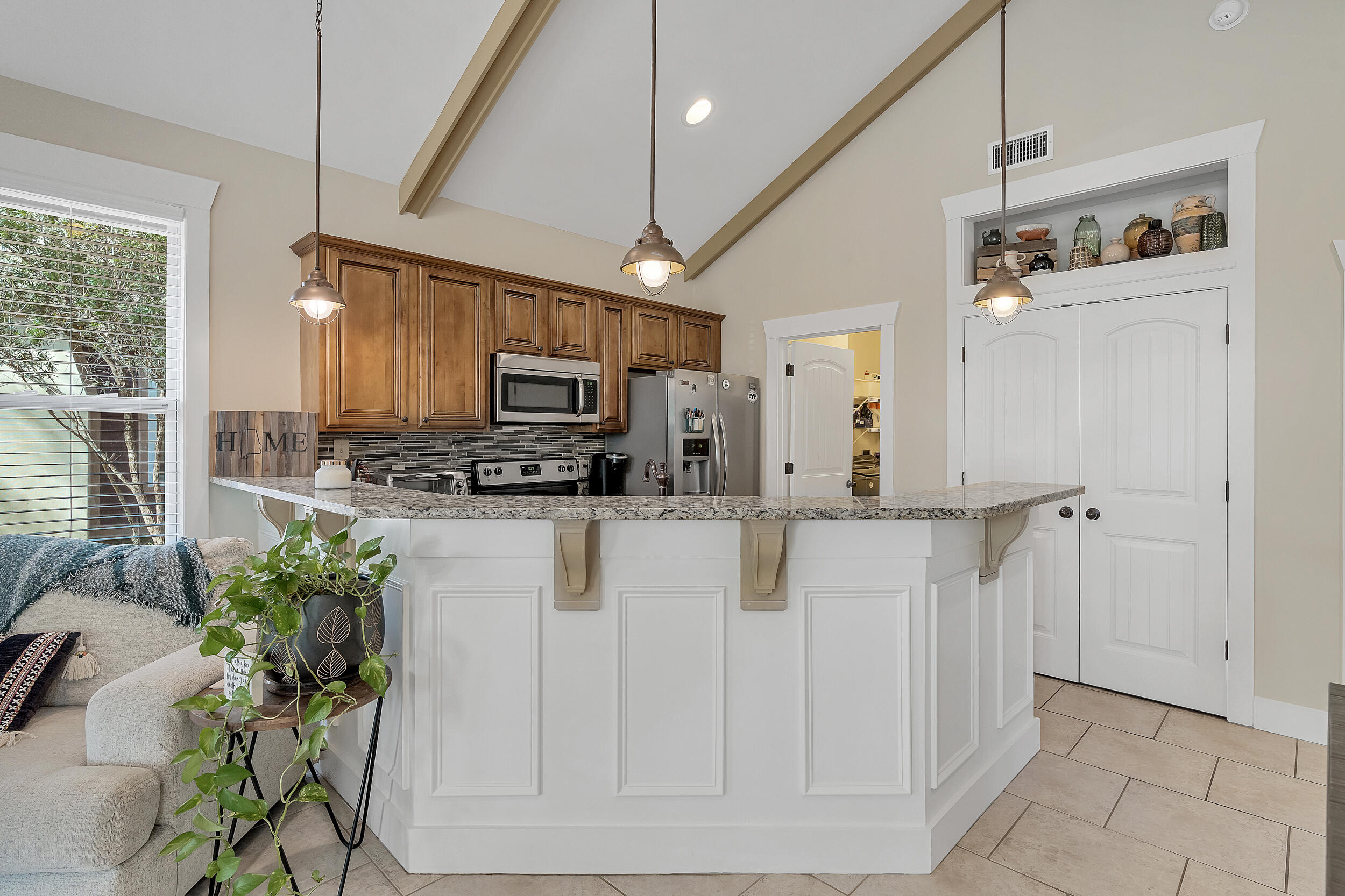 719 Earl Godwin Road Freeport, FL 32439 - Photo 10 of 23 a view of kitchen with stainless steel appliances cabinets