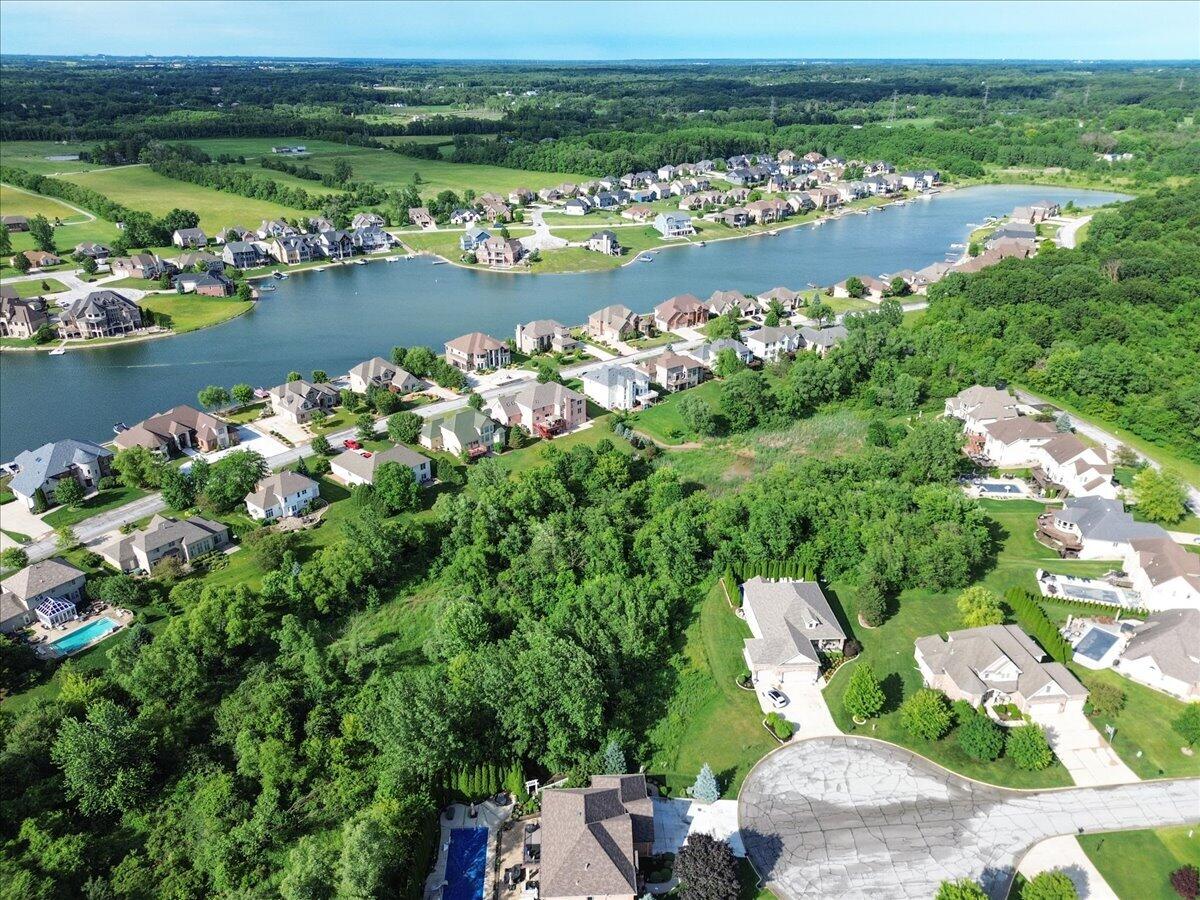 8751 Bridgewater Court Crown Point, IN 46307 - Photo 48 of 49 an aerial view of a house with a lake view