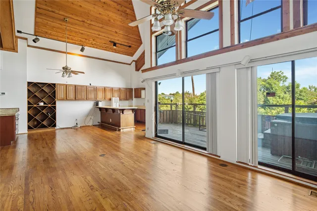 a kitchen with a sink and a stove top oven