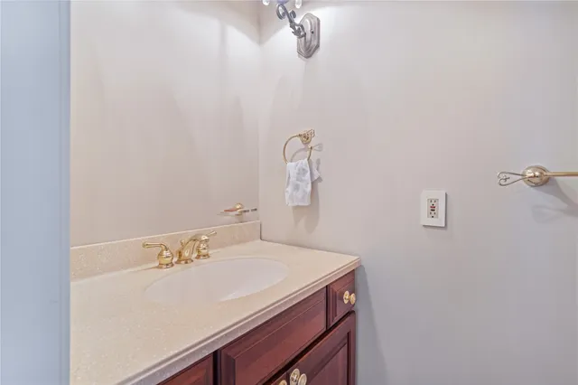 a room with pool table and windows