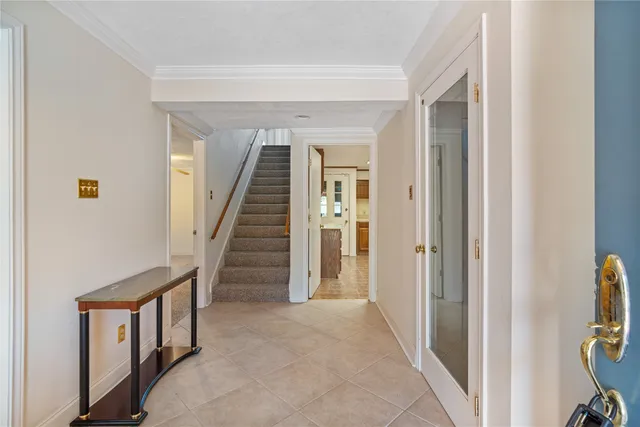 a view of a hallway with staircase