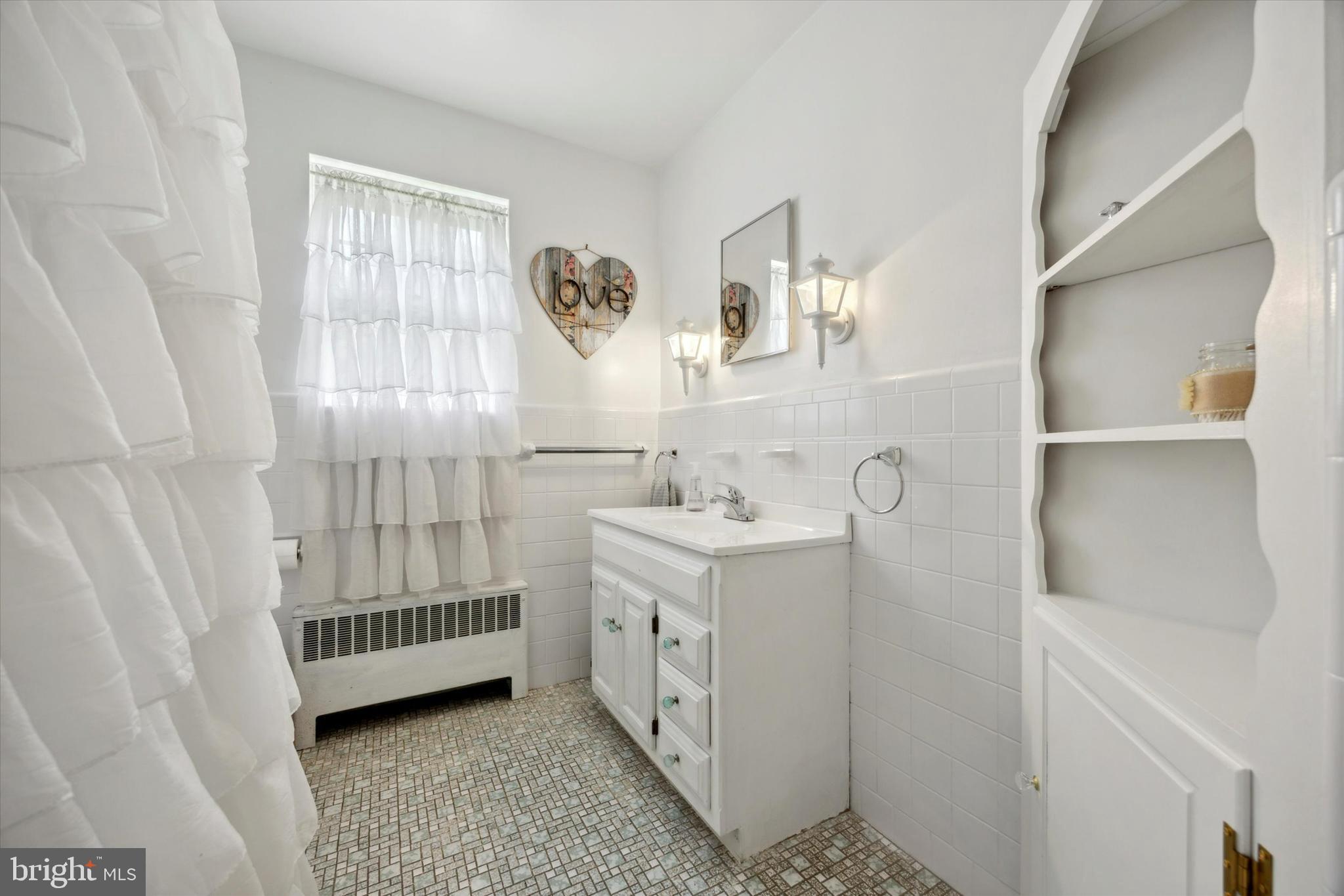 110 North State Road Springfield, PA 19064 - Photo 9 of 25 Updated hall bath 1st floor