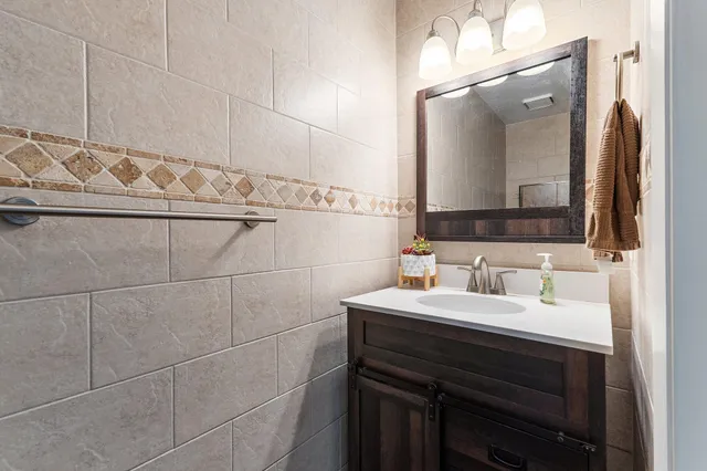 a view of an entryway with wooden floor and stairs