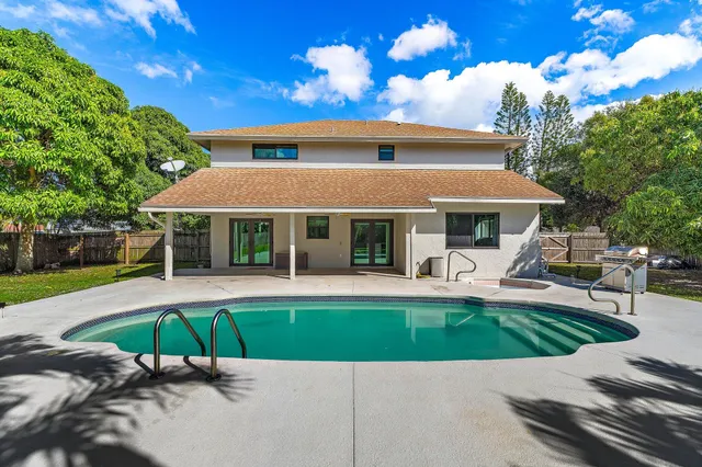 a view of a golf course with a lake
