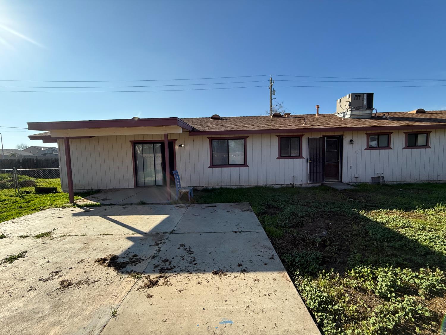 16385 North D Street Madera, CA 93638 - Photo 16 of 26 a front view of a house with a yard