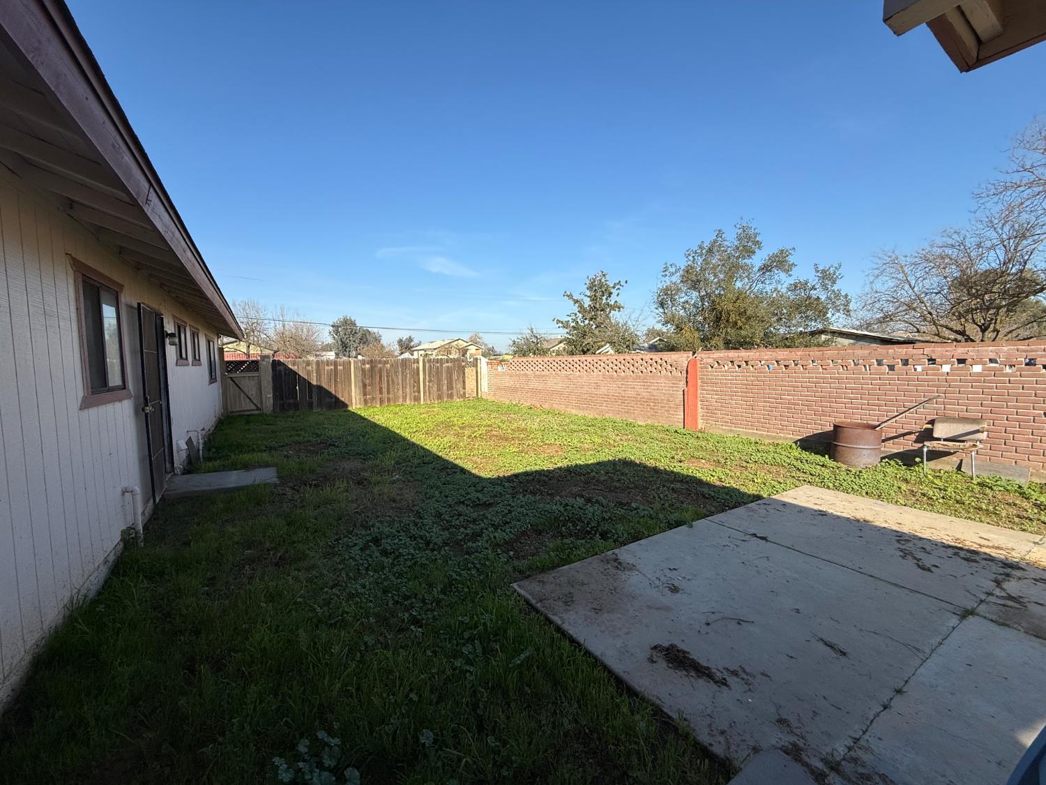 16385 North D Street Madera, CA 93638 - Photo 17 of 26 a view of a yard and an ocean