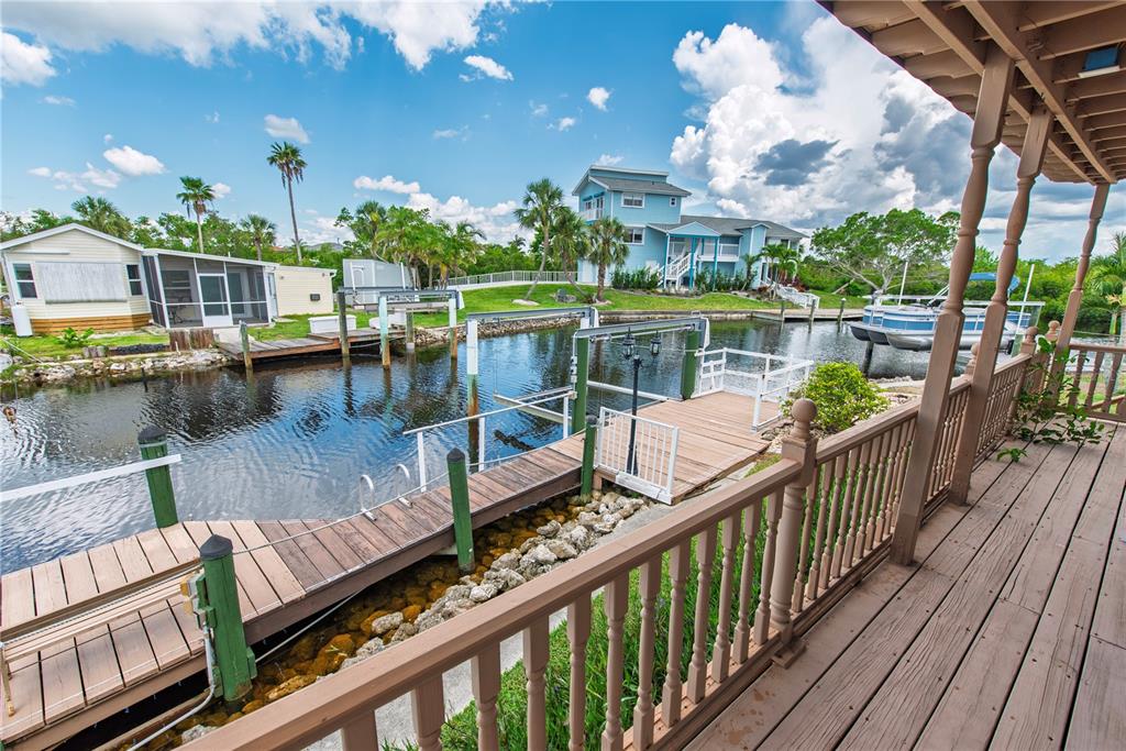 53 Rotterdam Punta Gorda, FL 33950 - Photo 16 of 26 a view of a lake from a balcony