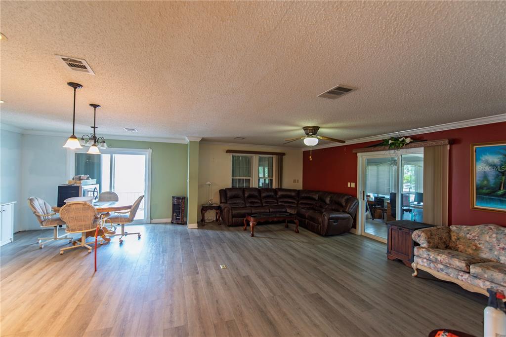 53 Rotterdam Punta Gorda, FL 33950 - Photo 3 of 26 a living room with furniture and wooden floor