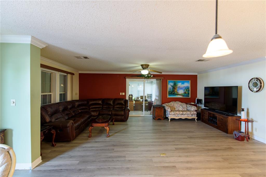 53 Rotterdam Punta Gorda, FL 33950 - Photo 4 of 26 a living room with furniture and a flat screen tv