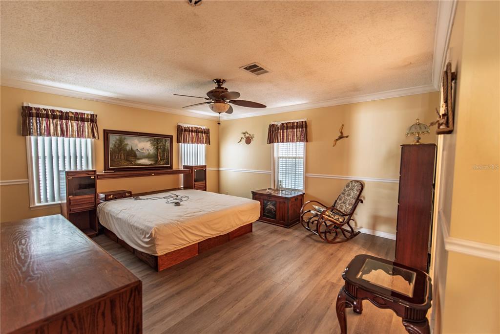 53 Rotterdam Punta Gorda, FL 33950 - Photo 7 of 26 a bedroom with furniture and a flat screen tv